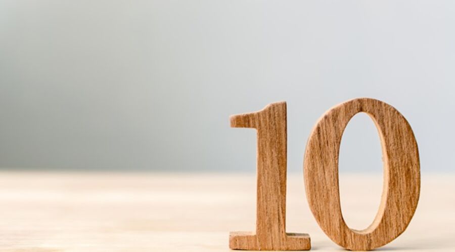 Wood sign number ten on table with copy space